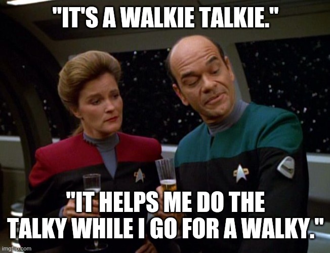 Janeway and The Doctor in the mess hall; Doc showing off his new emiter. "It's a walkie talkie. It helps me do the talky while I go for a walky."